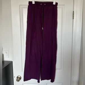 Matching set. Purple wide leg sweats and cotton sports bra/top.